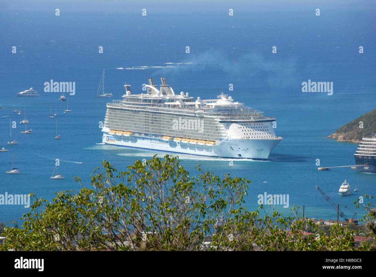 Large cruise liner entering harbor, St Thomas, Caribbean Stock Photo