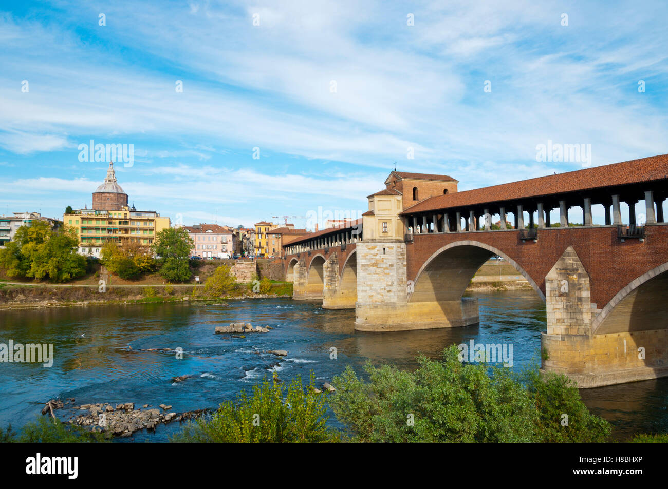 Ponte Coperto, crosses River Ticino, San Teodore church in background, Pavia, Lombardy, Italy Stock Photo