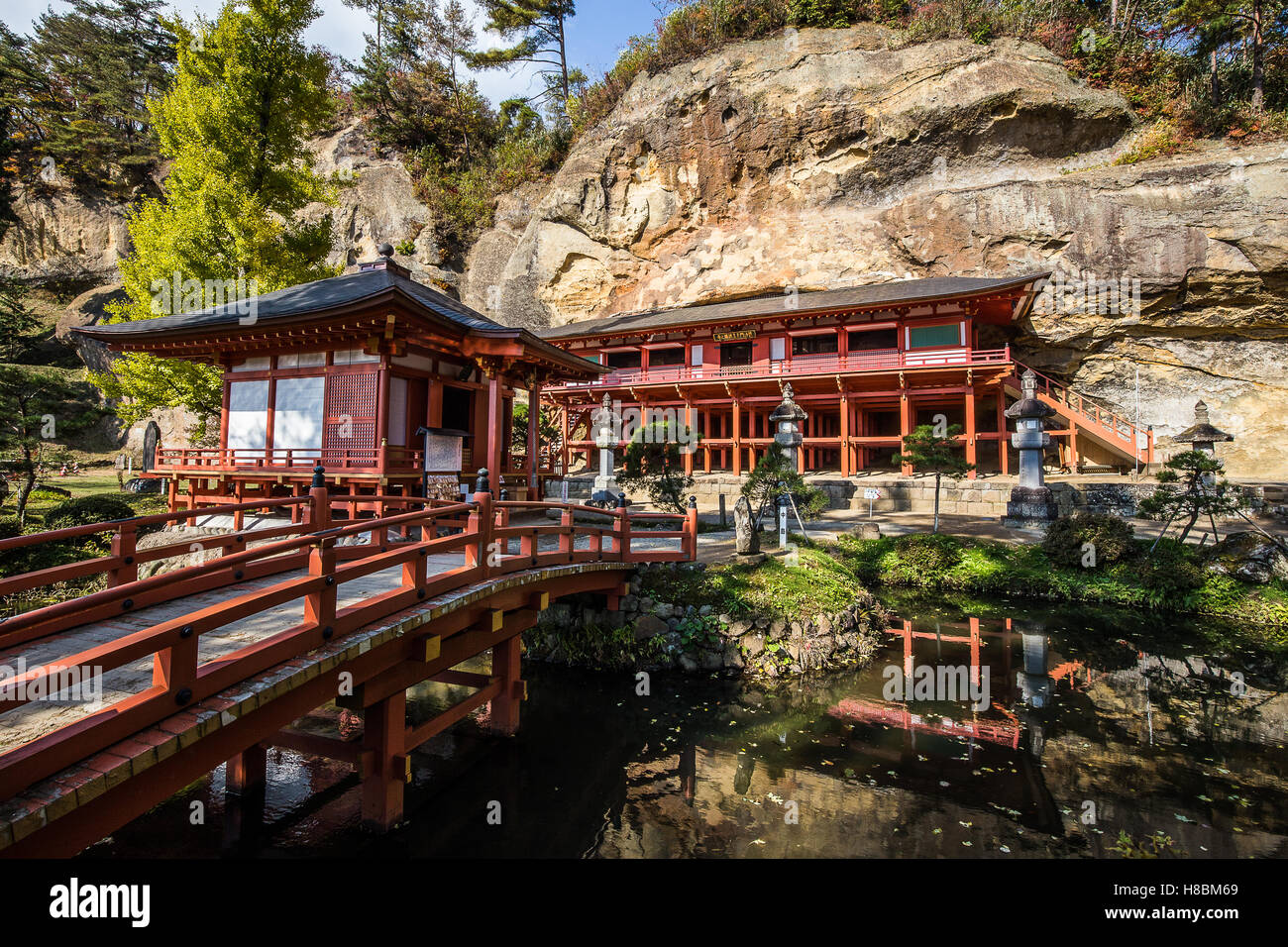 Takkoku no Iwaya Temple was built embedded in the rock wall of a cliff 1,200 years ago during the early Heian period. Stock Photo