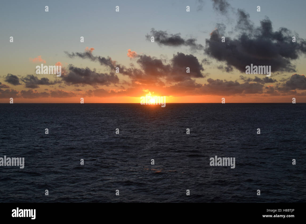 Abstract sunrise over ocean sun hi-res stock photography and images - Alamy