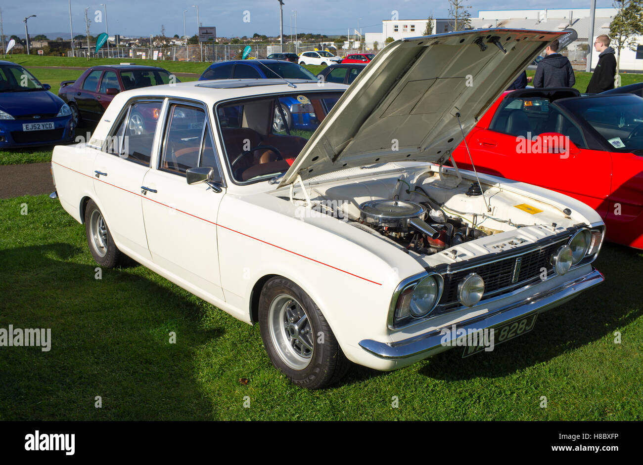 White Ford Cortina classic car at the Cornwall Motor Show, Heartlands Pool England UK. Stock Photo