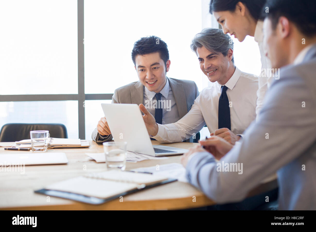 Chinese business people having meeting in board room Stock Photo Alamy