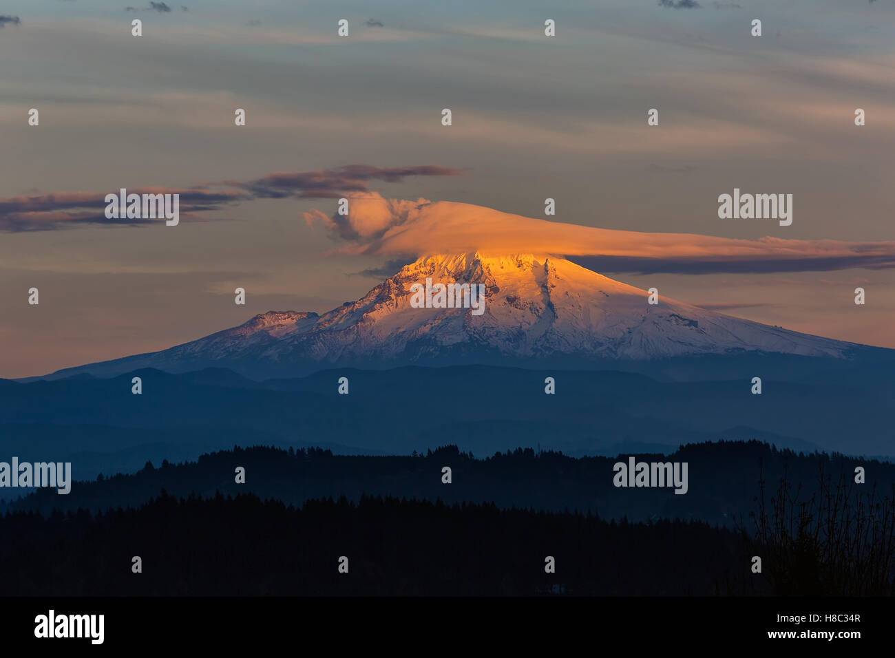 Lenticular Clouds over Mount Hood in Oregon during sunset Stock Photo