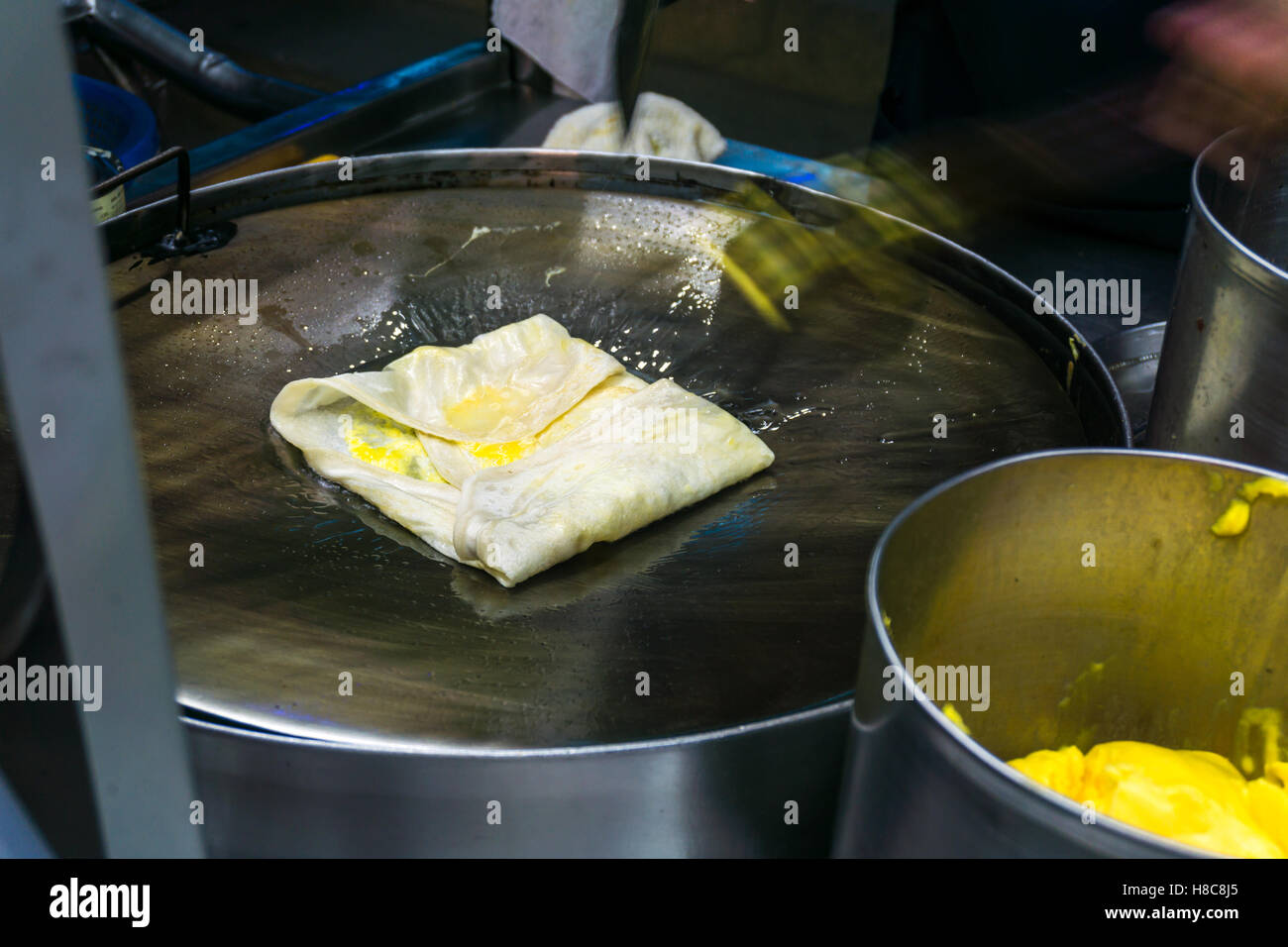 Roti pile in street food at thailand Stock Photo - Alamy