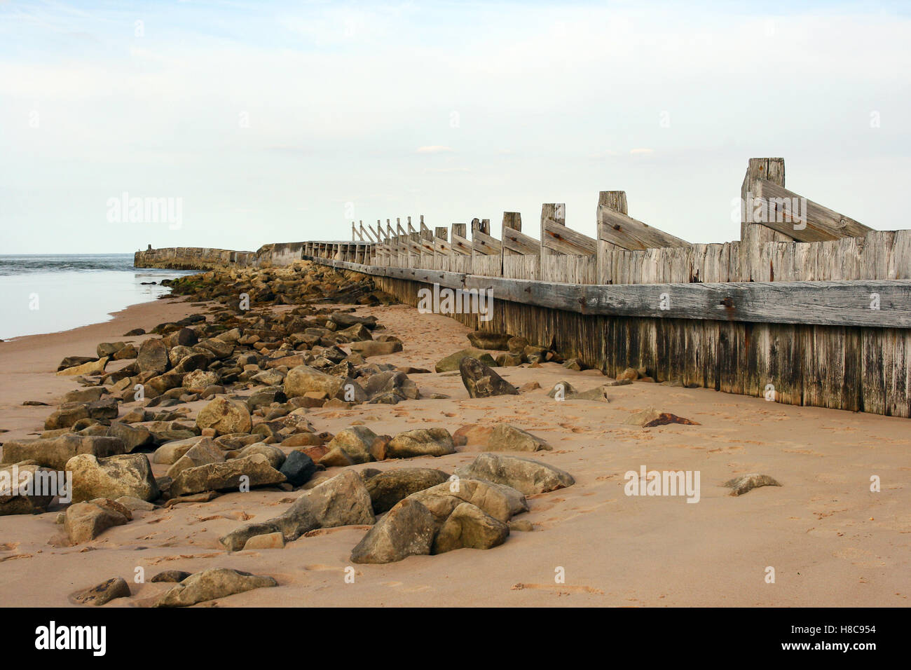 Coastal erosion defenses on the beach at Kinloss in the North East of Sea and sand defenses in the town of Kinloss Scotland Stock Photo