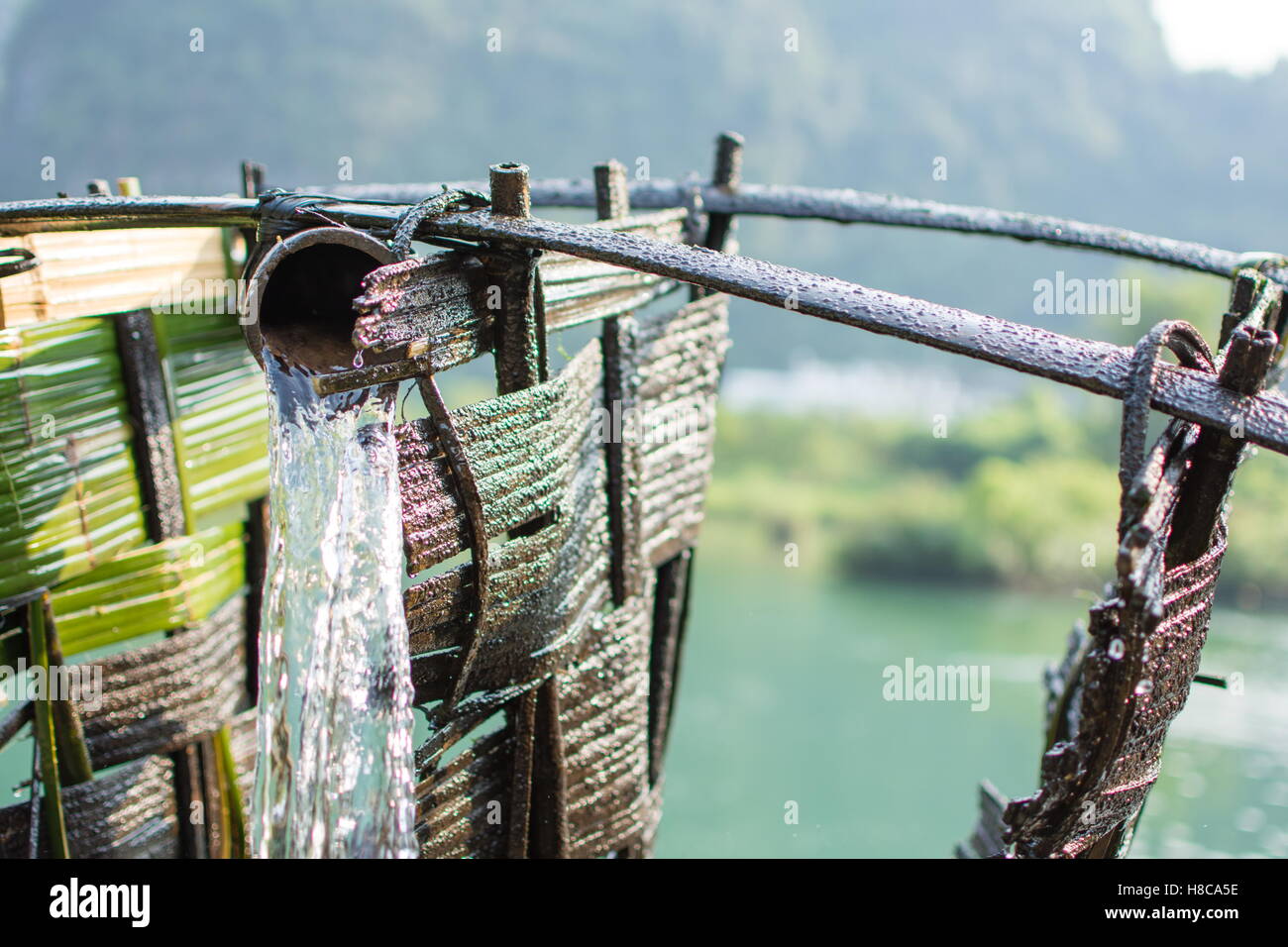 Old wooden watermill close up. Power of nature Stock Photo