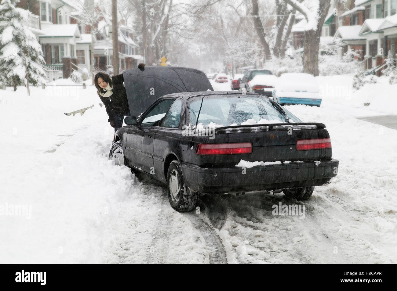 Car Stuck In Snow Bank Stock Photo Alamy