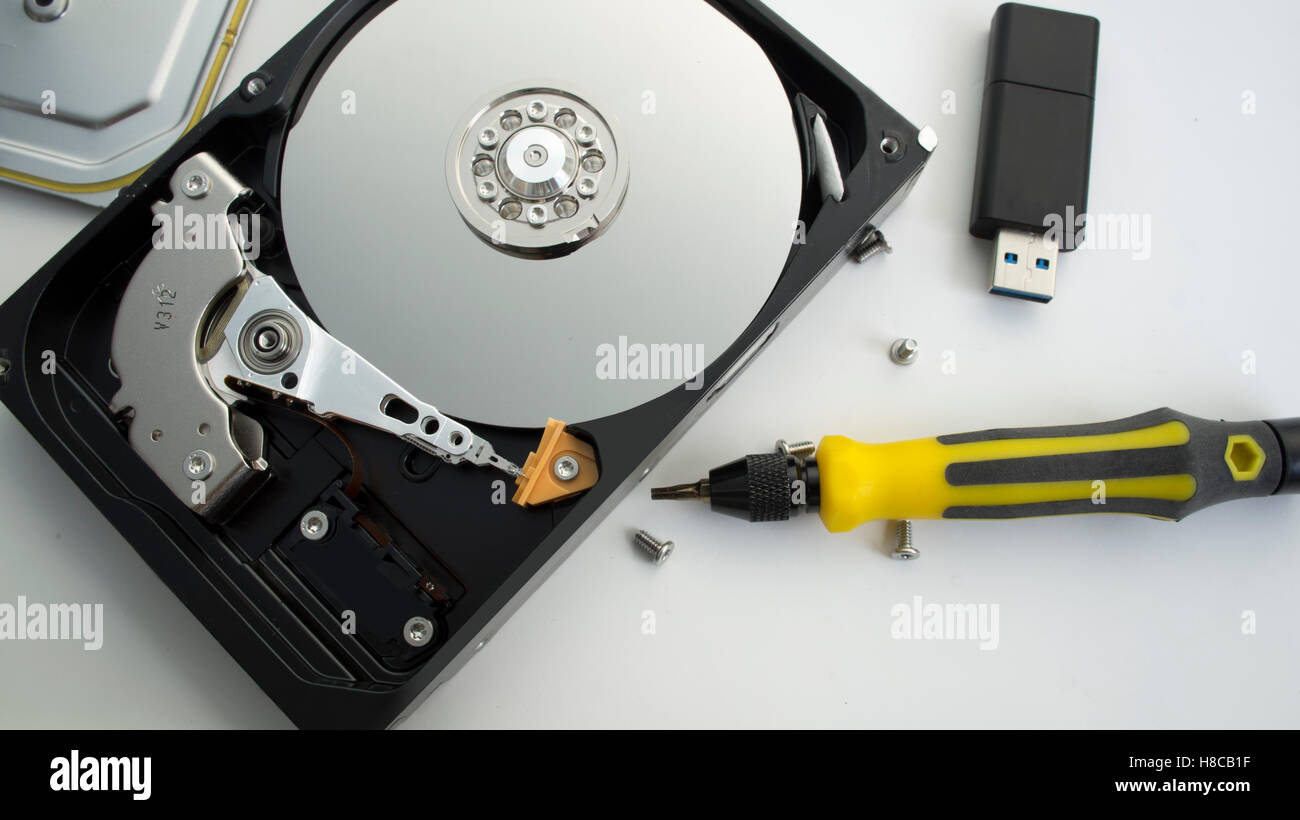harddrive repair industry device detail database component storage disc fixing screwdriver tool screw Stock Photo