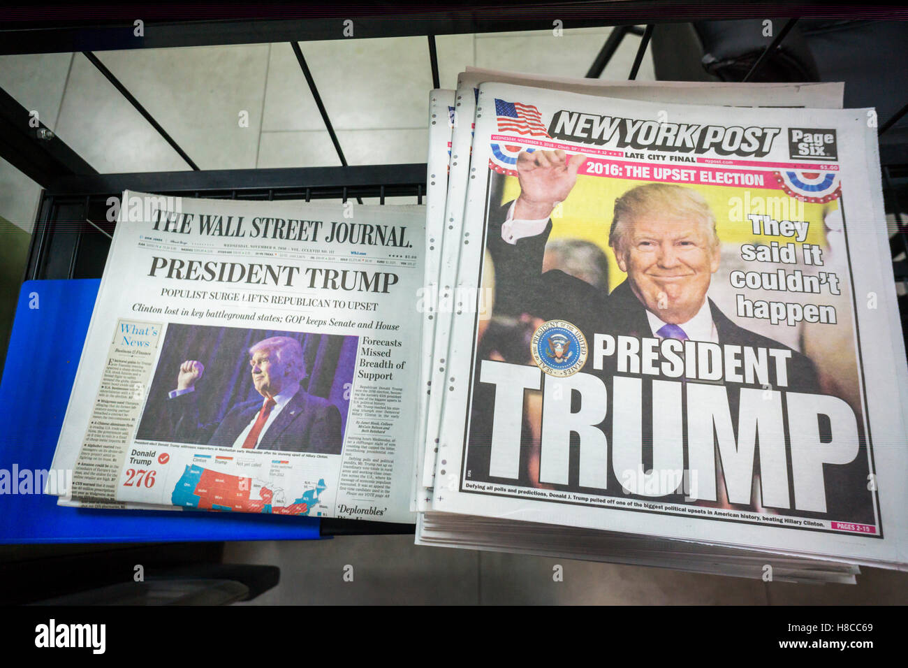 Despite the 3:00 AM concession, the News Corp. newspapers in New York came out with a print edition in time for the morning, seen on a newsstand in New York on Wednesday, November 9, 2016. Hillary Clinton conceded the election at about 3:00 AM making it a late night for everyone.  (© Richard B. Levine) Stock Photo