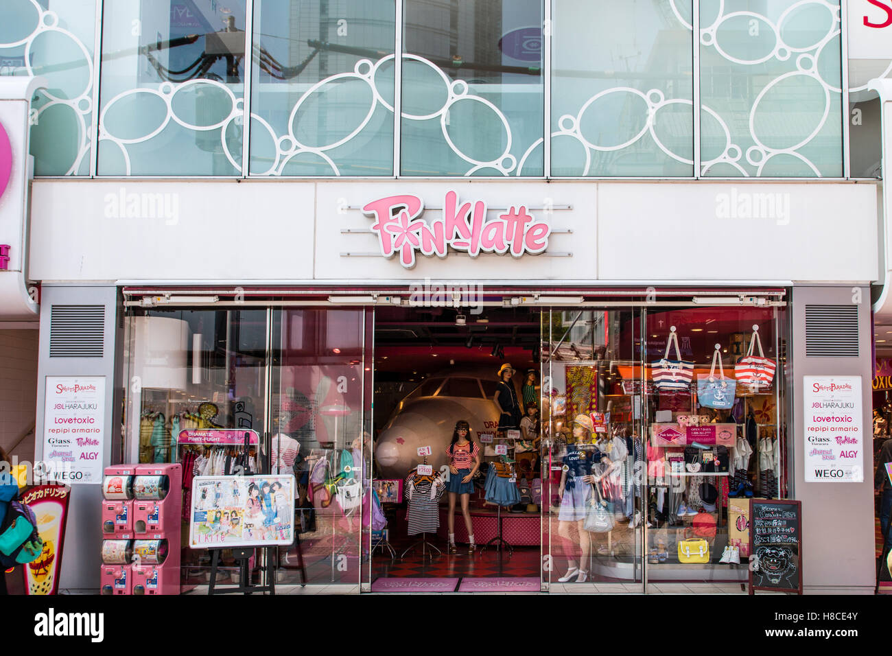 Japan, Tokyo, Harajuku, Takeshita-dori. Pinklatte teenage 'Harajuku style' fashionable boutique store. Shop front with window display and name logo. Stock Photo