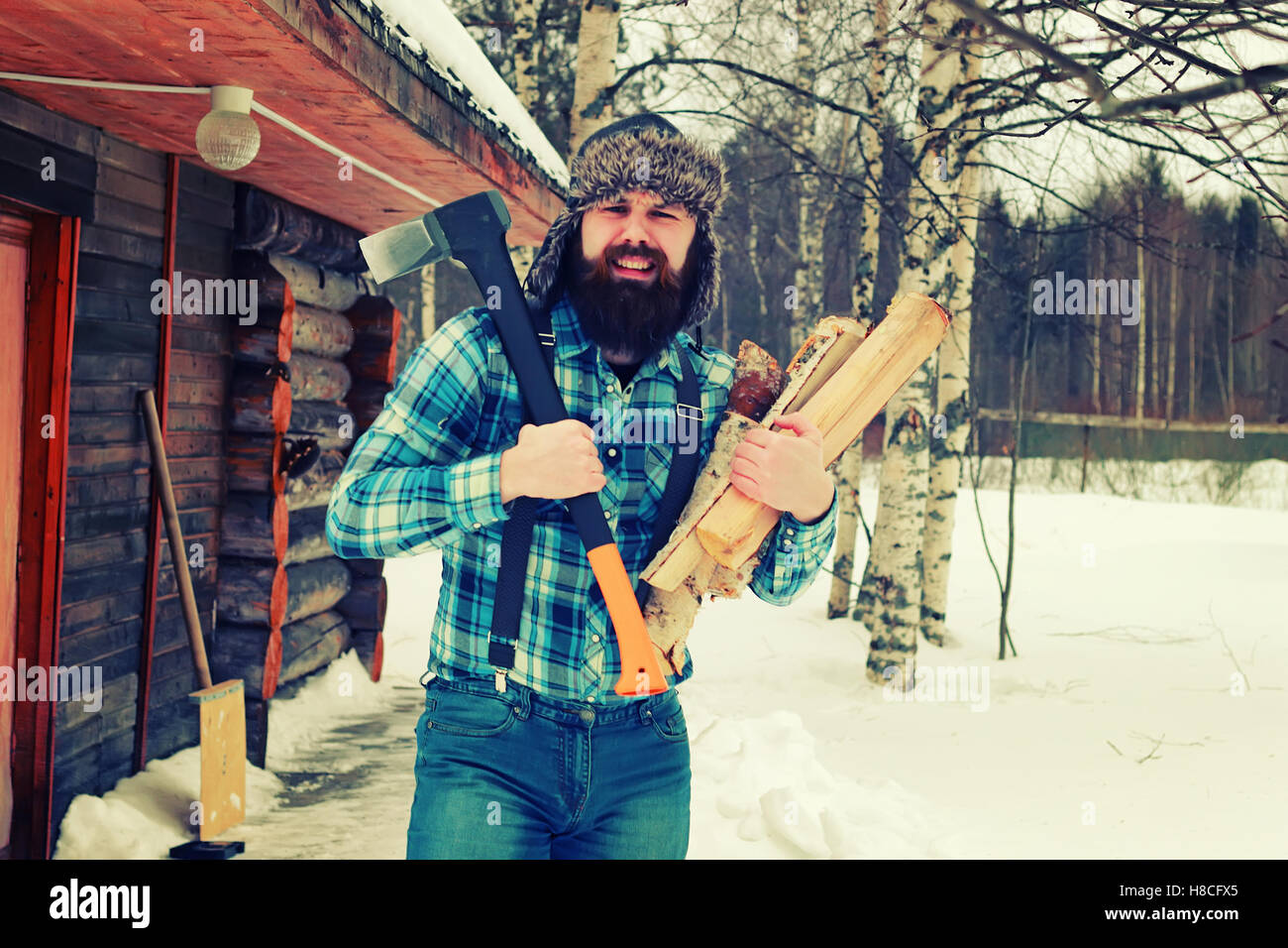 winter man axe wood Stock Photo - Alamy