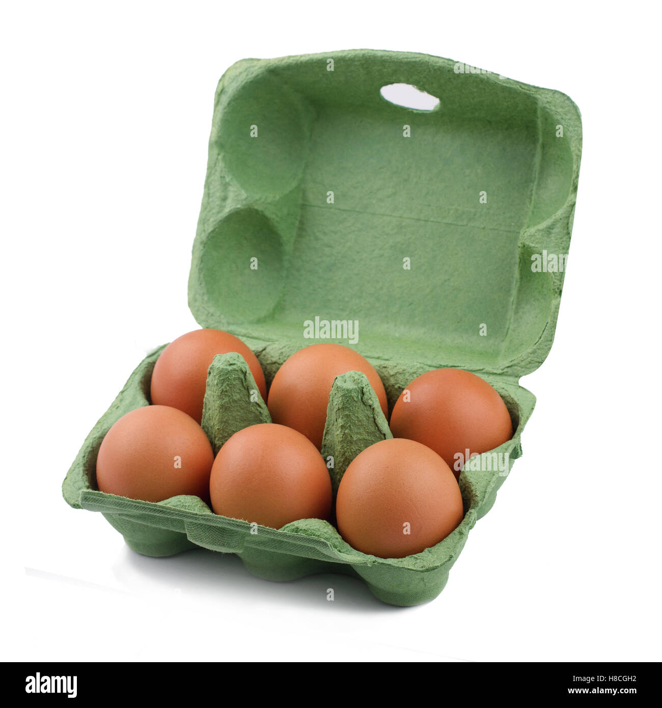 side view of green eco six egg cardboard open packaging isolated on white background Stock Photo