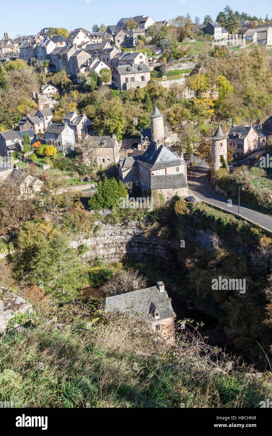 The Bozouls Hole (a  horseshoe-shaped gorge) and the eponymous lower village with its two medieval watchtowers (France). Stock Photo