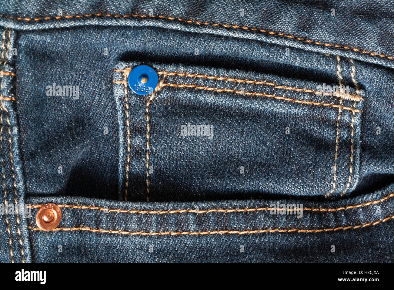 GAP 1969 studs on denim jeans Stock Photo