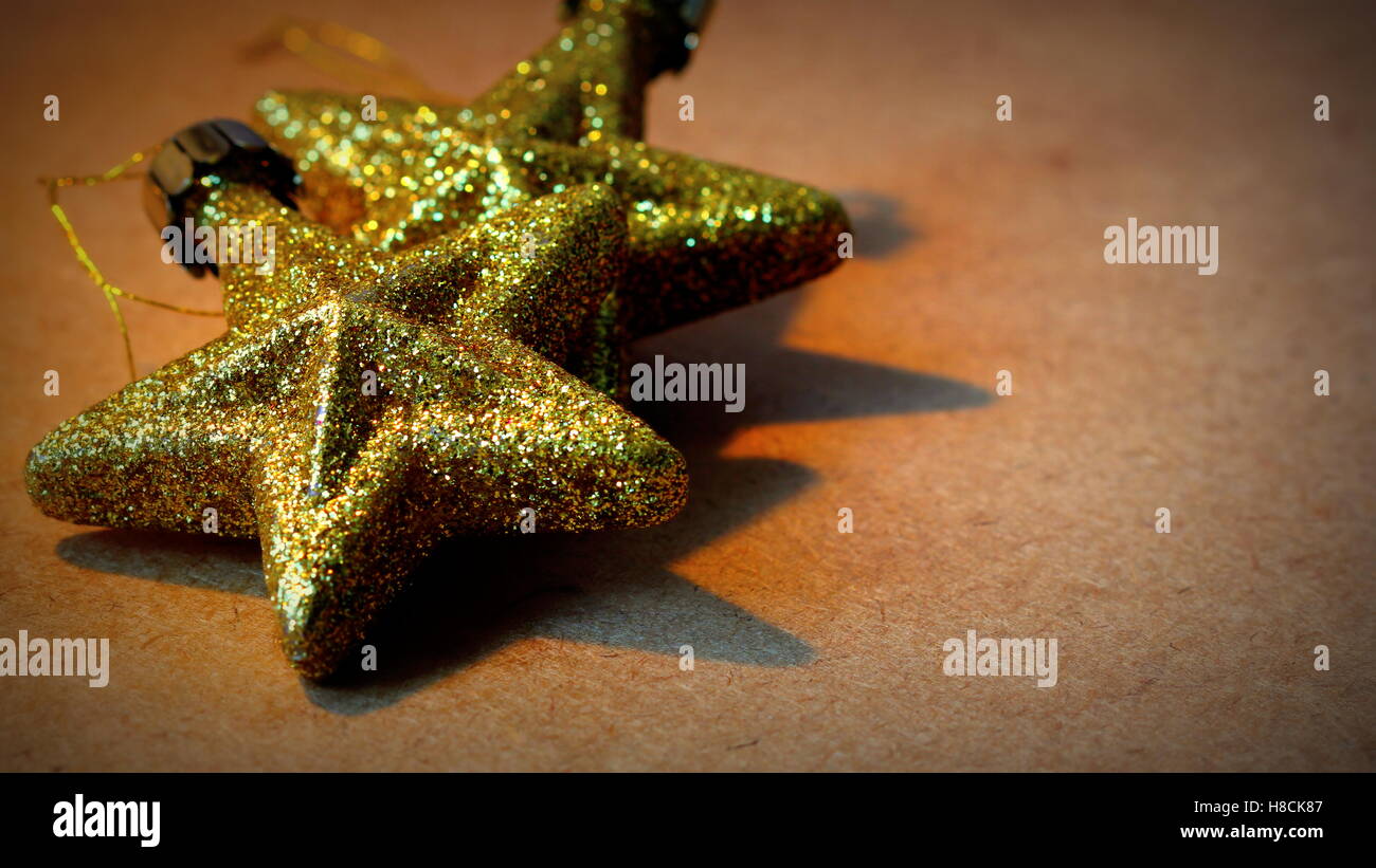 Christmas background with gold star decorations Stock Photo - Alamy
