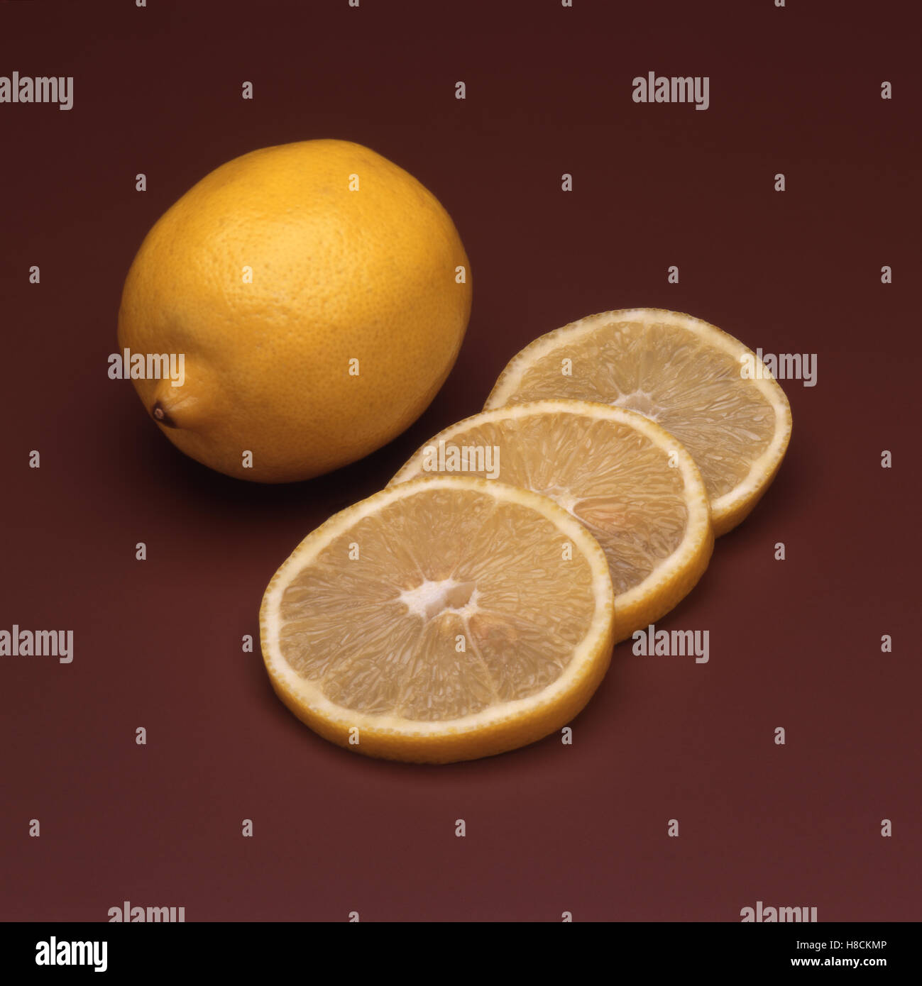 Lemon and Three Slices Stock Photo