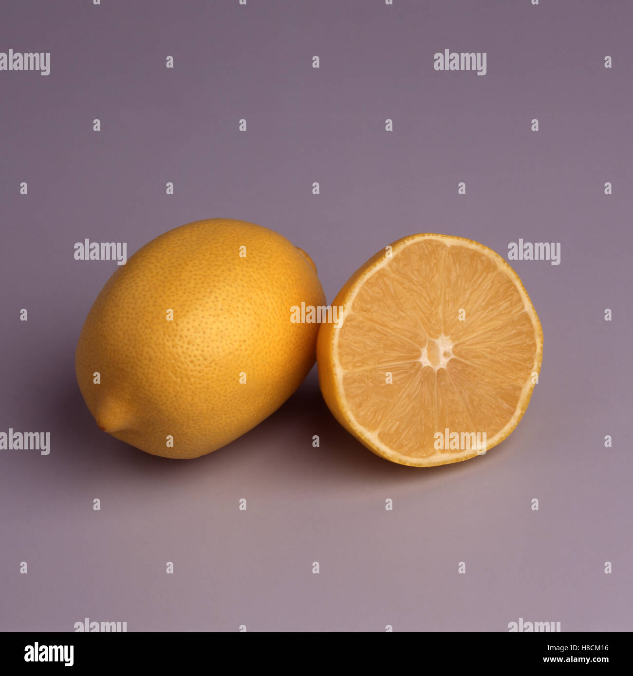 Lemon and half lemon Stock Photo