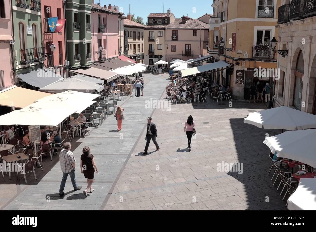 Sunny summer day in the cafe lined old town Plaza de San Martin in Leon, Spain, a popular stop along the Camino Frances. Stock Photo