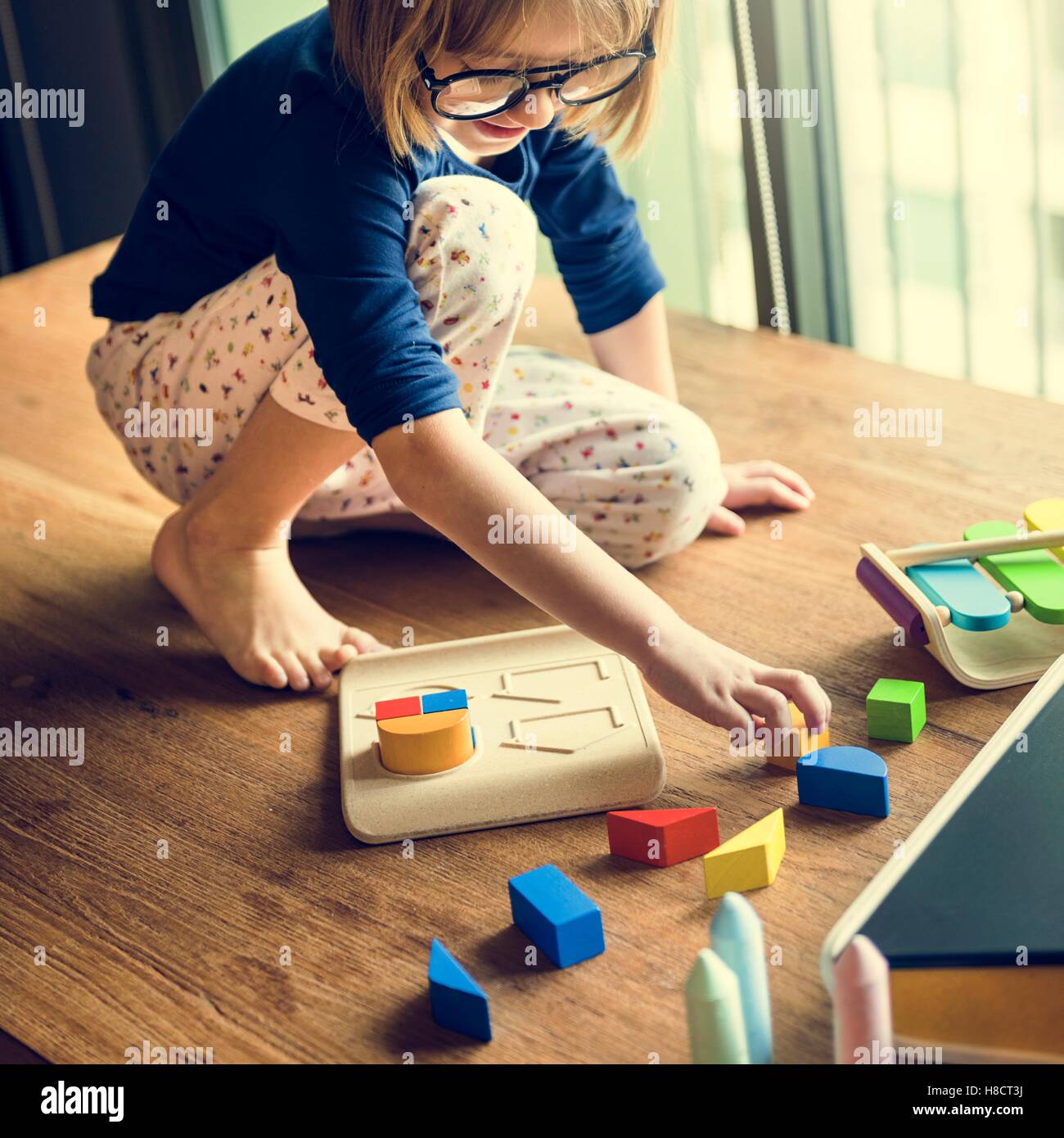 Little Girl Playing Toys Concept Stock Photo - Alamy