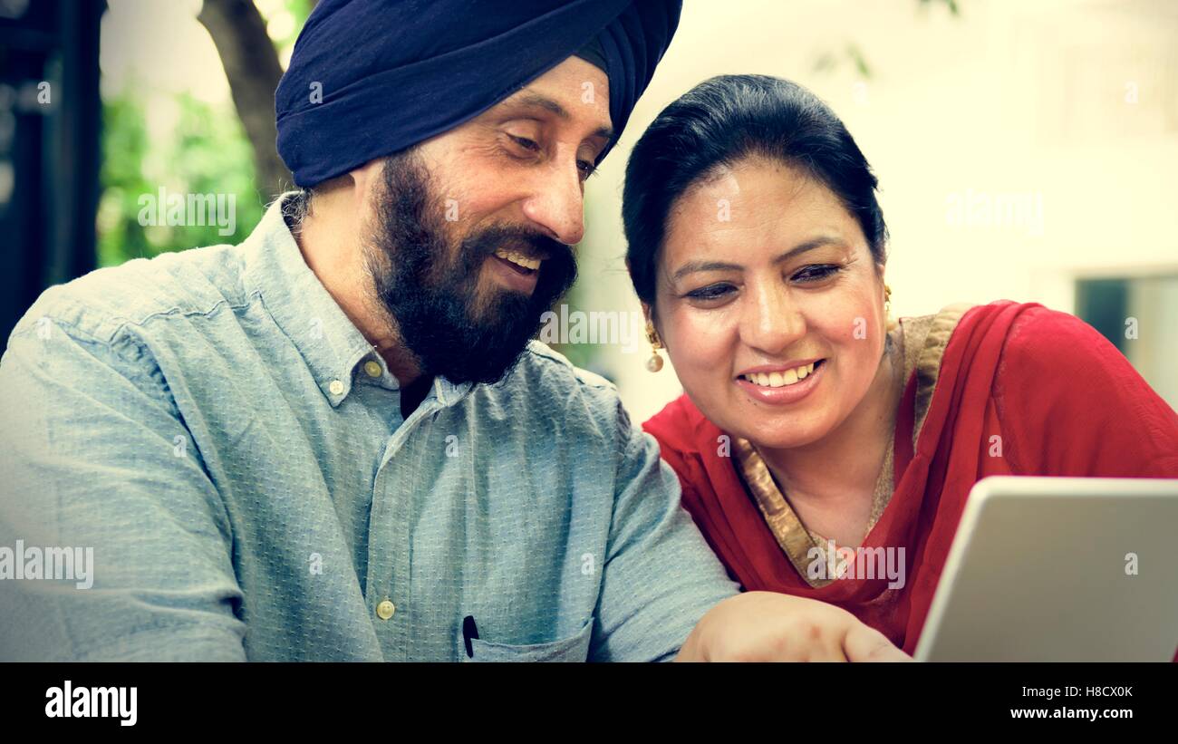 Indian Couple Using Device Concept Stock Photo Alamy