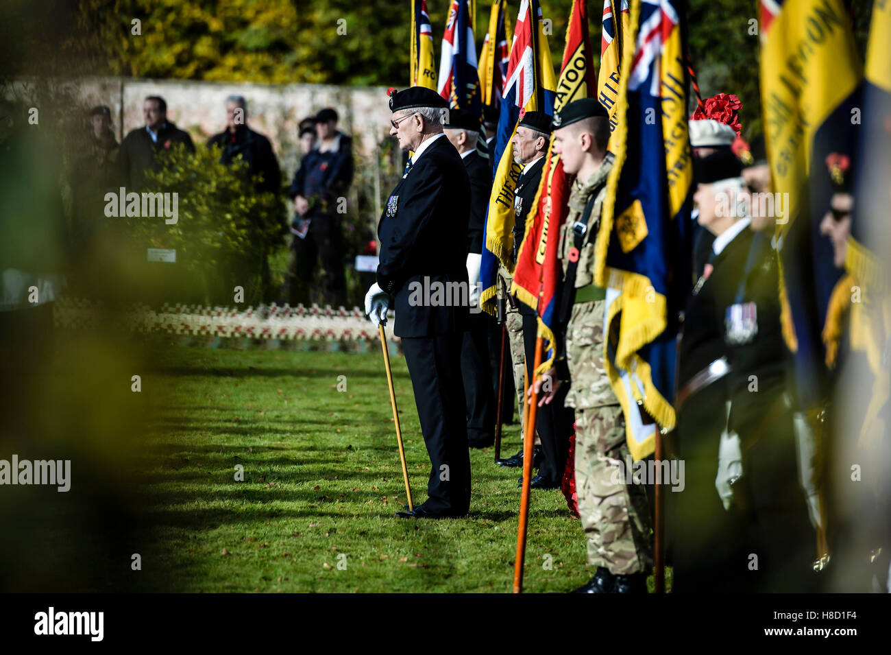 Royal British Legion standard bearers listen to prayers during a service for the opening of the Field of Remembrance at Royal Wootton Bassett, near Swindon. Stock Photo