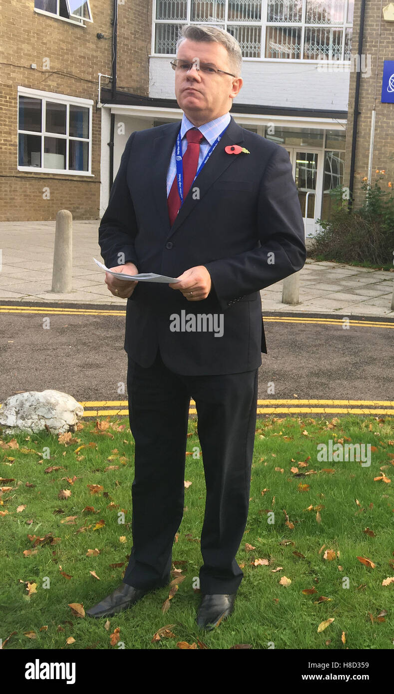 Martin Giles, headteacher of Meridian High School, reads a statement outside the school in Croydon regarding the involvement of four ex-pupils in yesterday's tram crash, one of whom, Dale Chinnery, died. Stock Photo