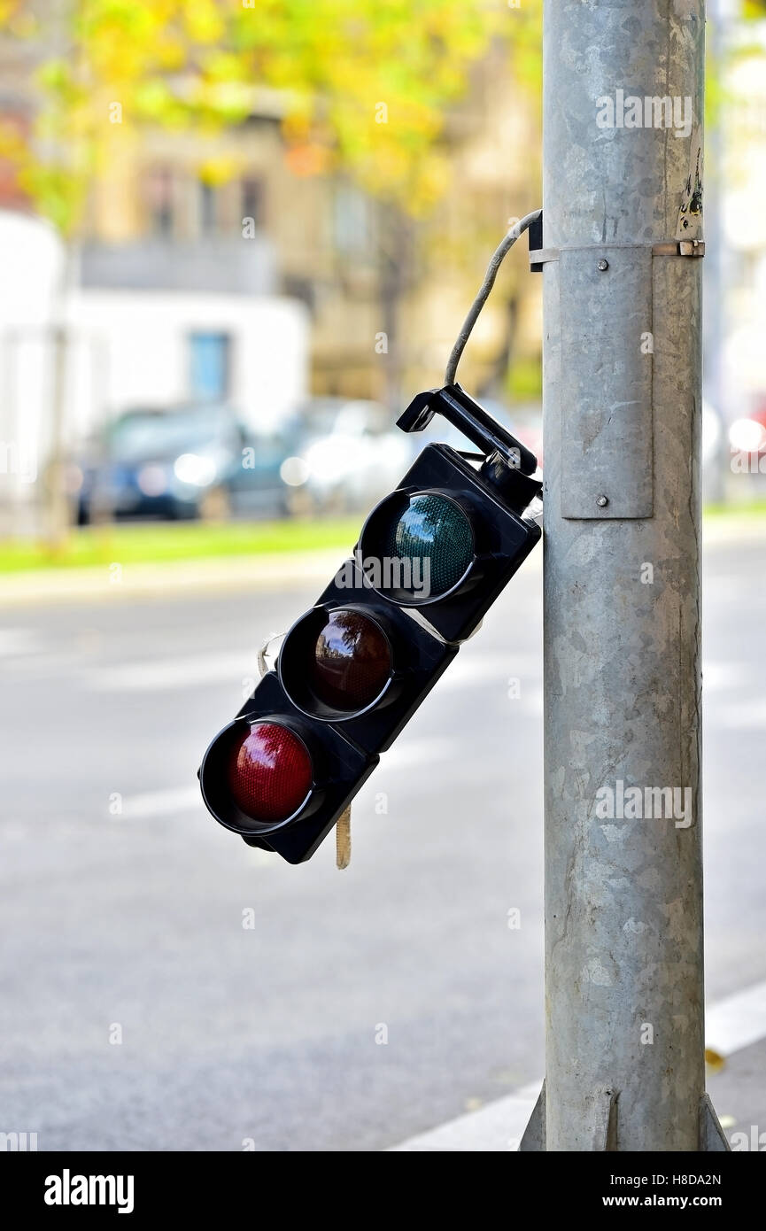 Broken traffic lights pole changing colors Stock Photo Alamy