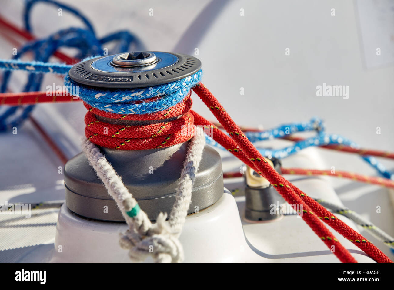 Tangled ropes on the winch a yacht Stock Photo Alamy