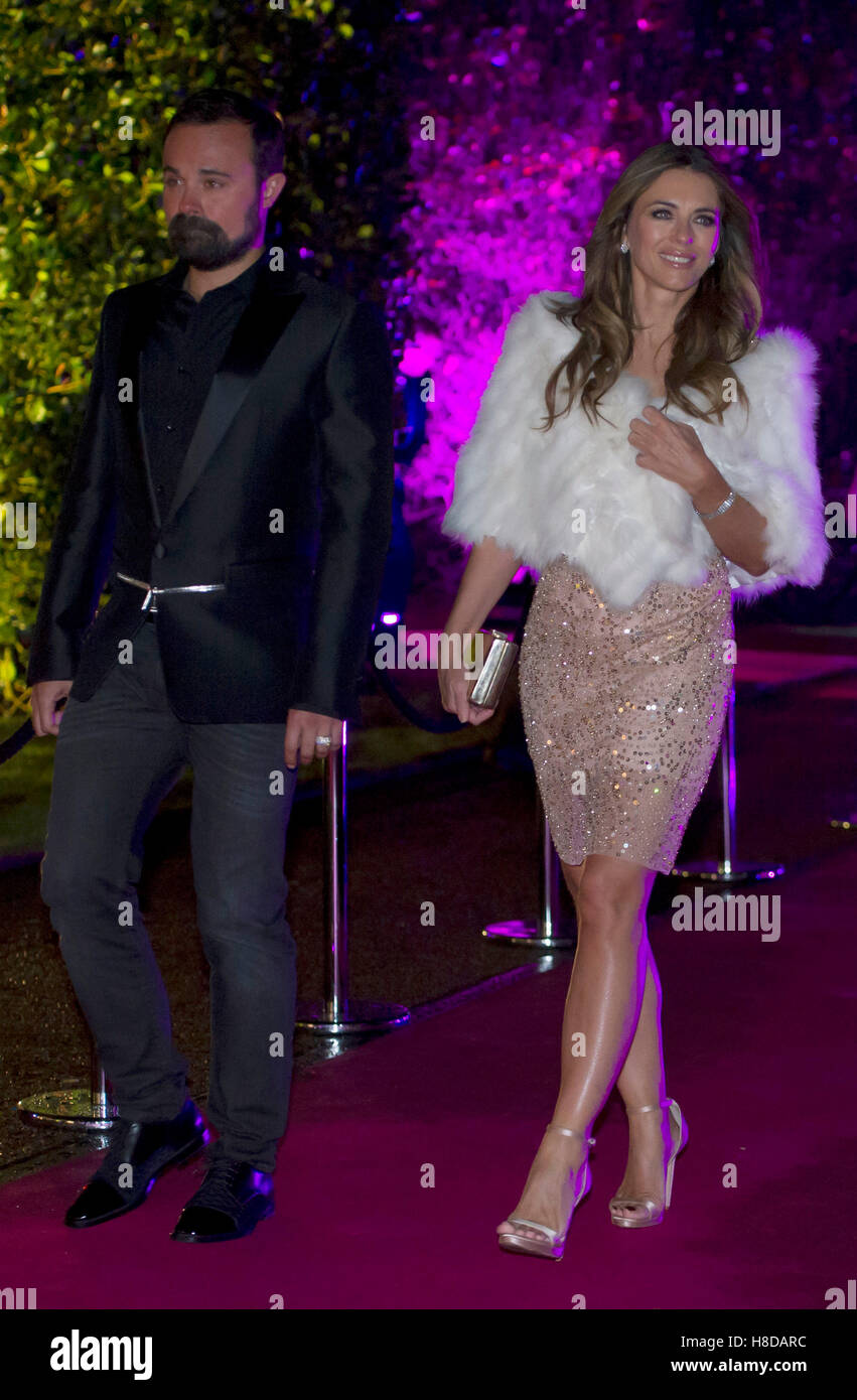 Elizabeth Hurley and Evgeny Lebedev arrive at a fundraising event and