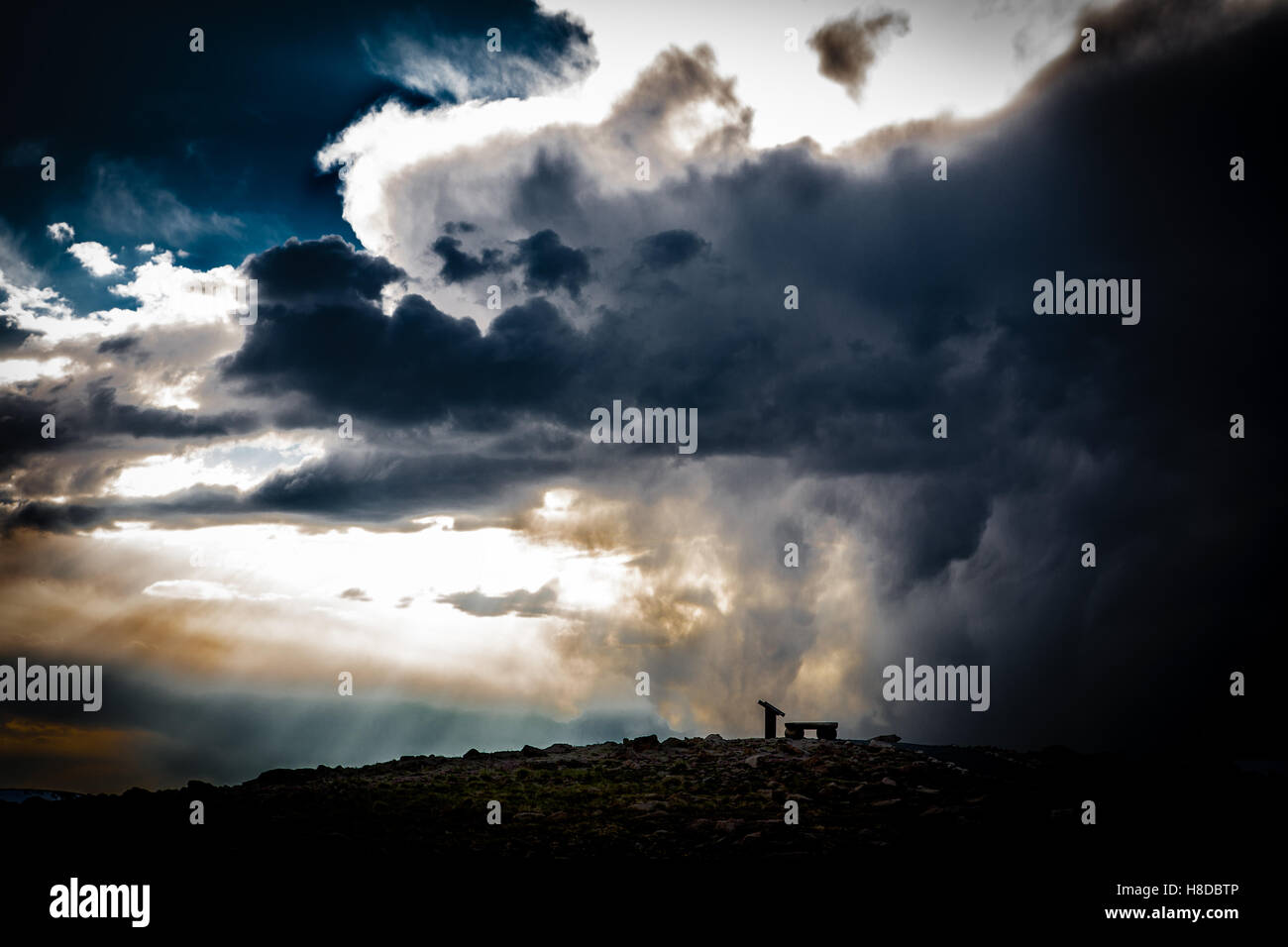 Dark clouds over mountains hi-res stock photography and images - Alamy