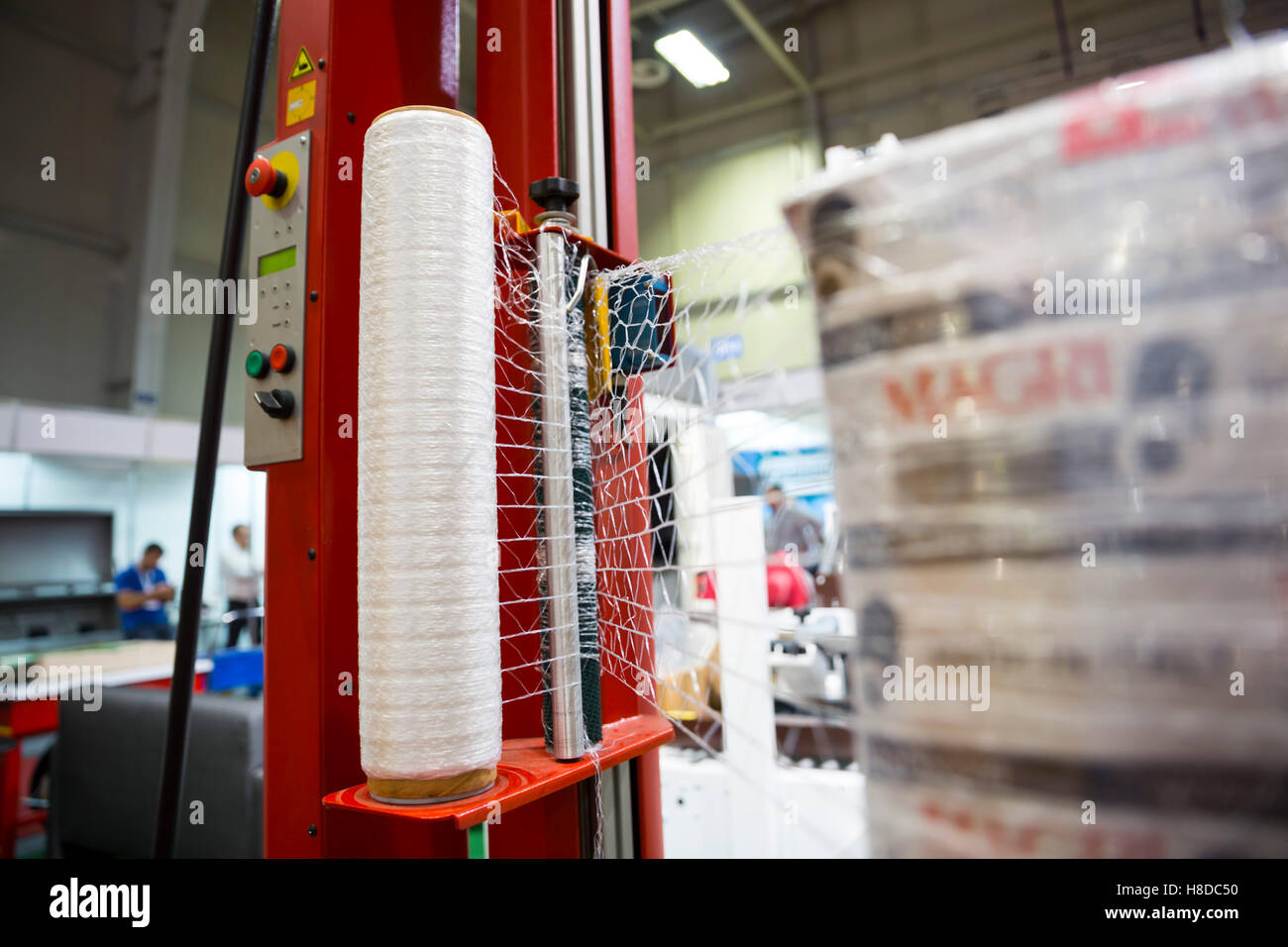 Packing machine is shown at a food and drink exhibition Stock Photo Alamy