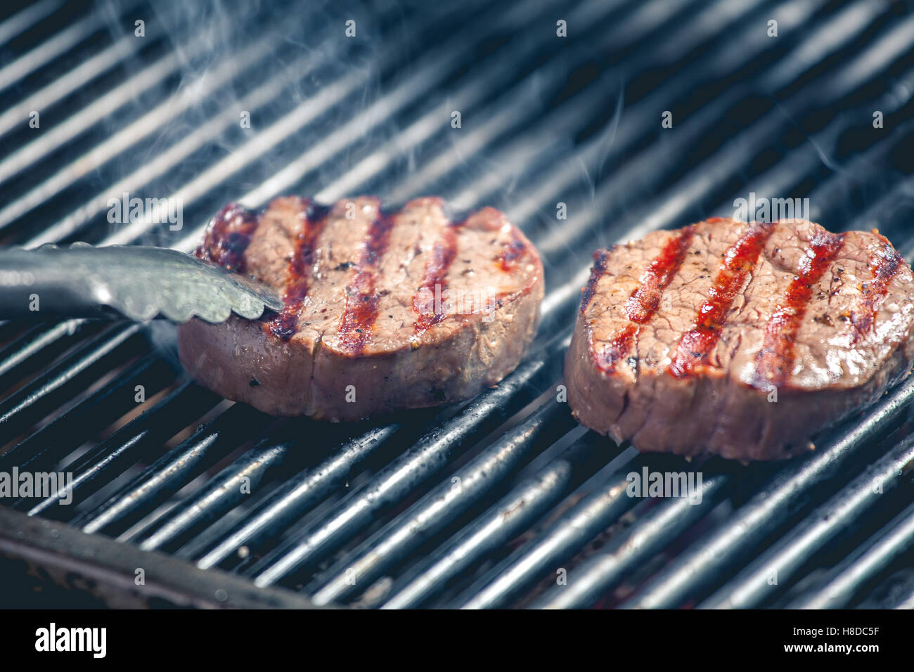 Delicious steak on the grill Stock Photo Alamy