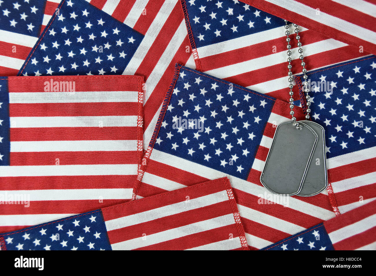 military dog tags on American flag collage Stock Photo - Alamy