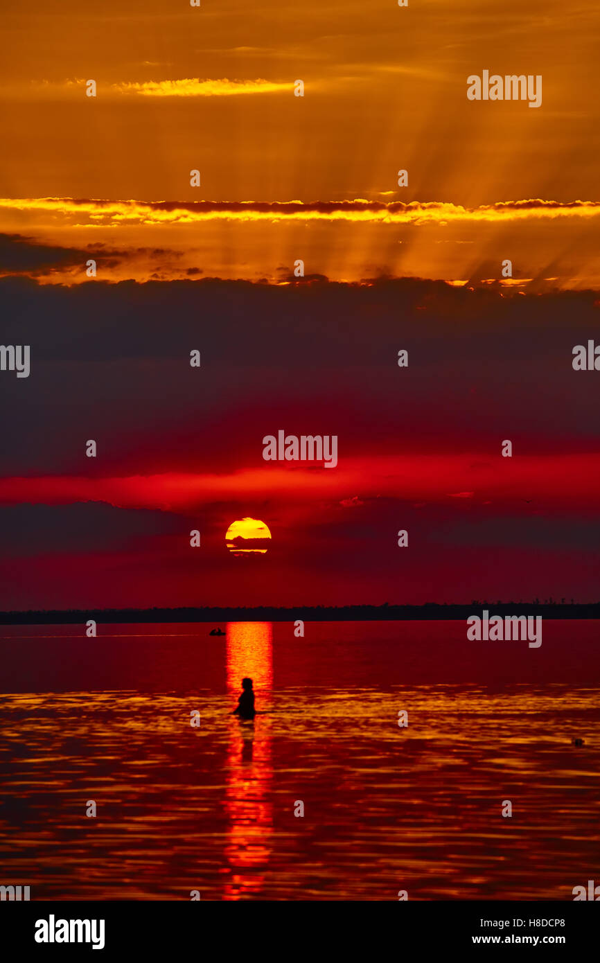 Sunrise in the sea with soft wave and cloudy Stock Photo - Alamy