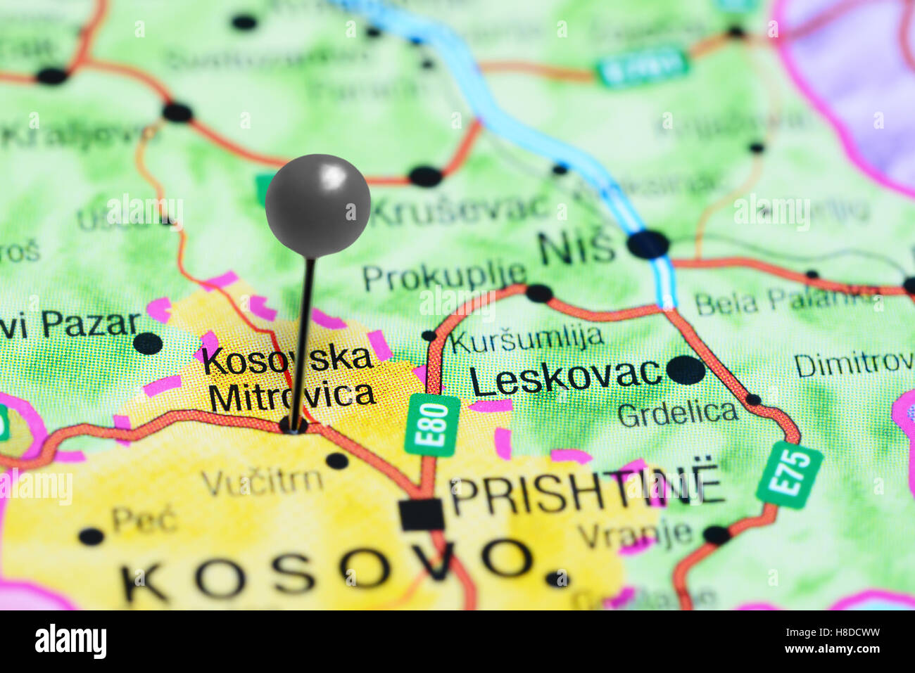 Kosovska Mitrovica pinned on a map of Kosovo Stock Photo
