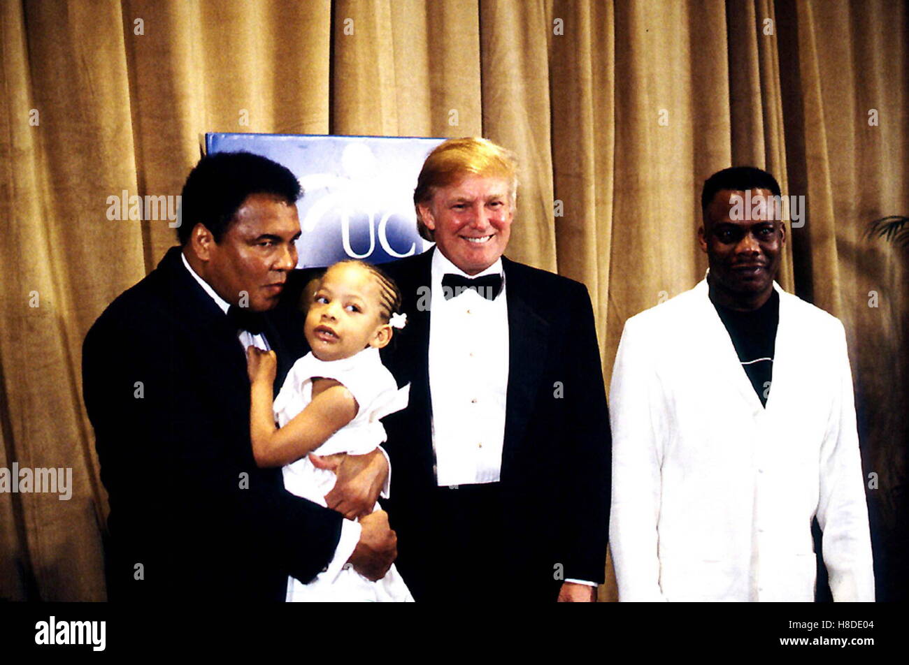 Jan. 1, 2011 - 3/14/01 UCP 46TH ANNUAL AWARDS DINNER.NY MARRIOTT MARQUIS HOTEL. MUHAMMAD ALI RECEIVES UNITED CEREBRAL PALSY'S HUMANITARIAN AWARD.*(AXYA AND DAD?), W/DONALD TRUMP. © Ken Babolcsay/ .I 5344 KBA.CREDIT: NAME// CREDIT: NAME// DTRUMPMN © Globe Photos/ZUMAPRESS.com/Alamy Live News Stock Photo