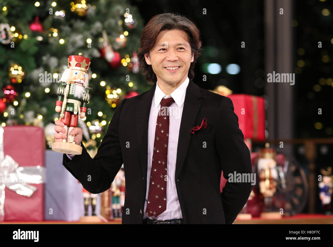 Tokyo, Japan. 10th Nov, 2016. Tetsuya Kumakawa, Japanese ballet dancer and director of the K Ballet Company holds a nutcracker as he attends the light-up ceremony of a large Christmas tree at the Marunouchi building in Tokyo on Thursday, November 10, 2016. The Marunouchi area started illumination and decoration with motif of ballet dance Tchaikovsky's 'Nutcracker' through the Christmas Day. © Yoshio Tsunoda/AFLO/Alamy Live News Stock Photo