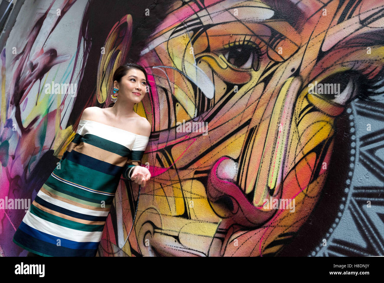 Hong Kong, Hong Kong S.A.R, China. 10th Nov, 2016. Wall painting by Parisian street artist Alexandre Monteiro aka Hopare of Hong Kong actress and canto pop star Niki Chow (pictured).''Walls of Change'' street art in Hong Kong ahead of the The 'Hope for Wildlife' Gala Dinner painted to raise awareness for the plight of endangered animals the world over.Sai Yin Pun Hong Kong.10th November 2016. Photo by Jayne Russell © Jayne Russell/ZUMA Wire/Alamy Live News Stock Photo