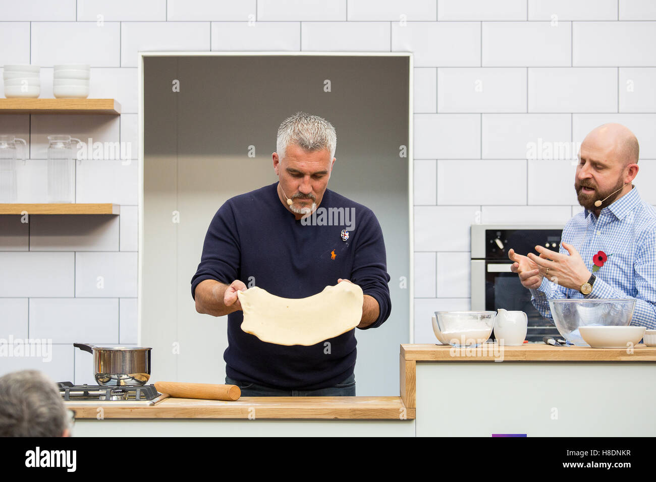 Paul Hollywood and Barney Desmazery during a cooking demo at BBC Good Food Show at Olympia London. Stock Photo