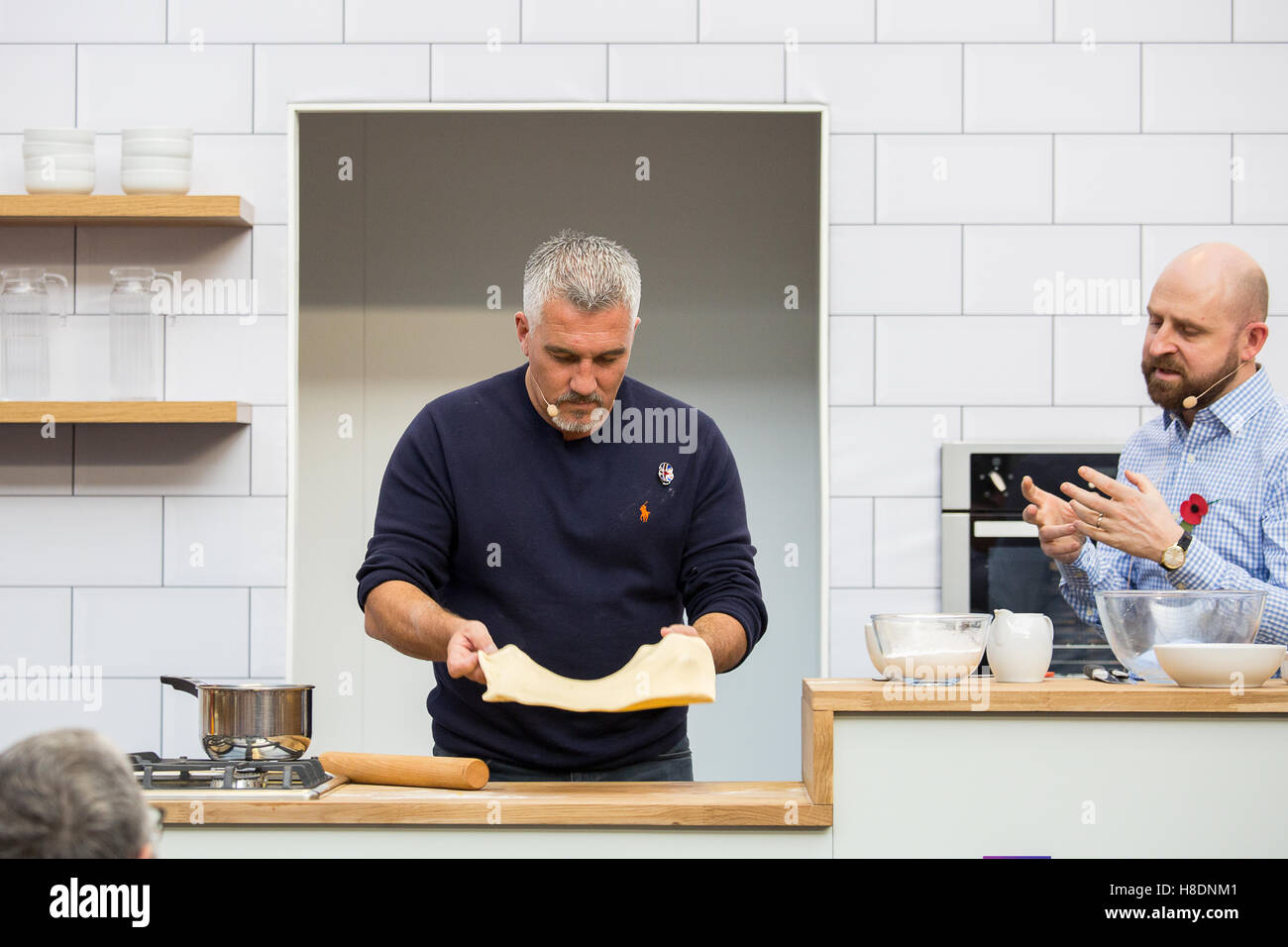 Paul Hollywood and Barney Desmazery during a cooking demo at BBC Good Food Show at Olympia London. Stock Photo