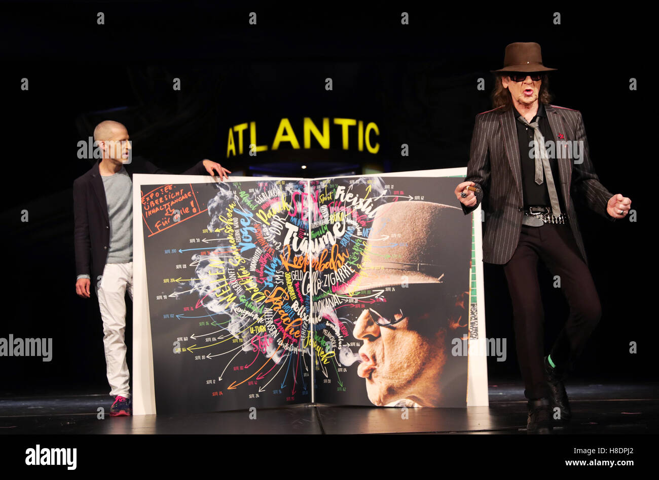 Musician Udo Lindenberg and author Benjamin von Stuckrad-Barre (l) present the new 'Bild' book 'Udo Froehliche: The Lindenberg encyclopedia from alcohol to cigarettes' on the stage of the opera house on the Reeperbahn in Hamburg, germany, 11 November 2016. Photo: Christian Charisius/dpa Stock Photo