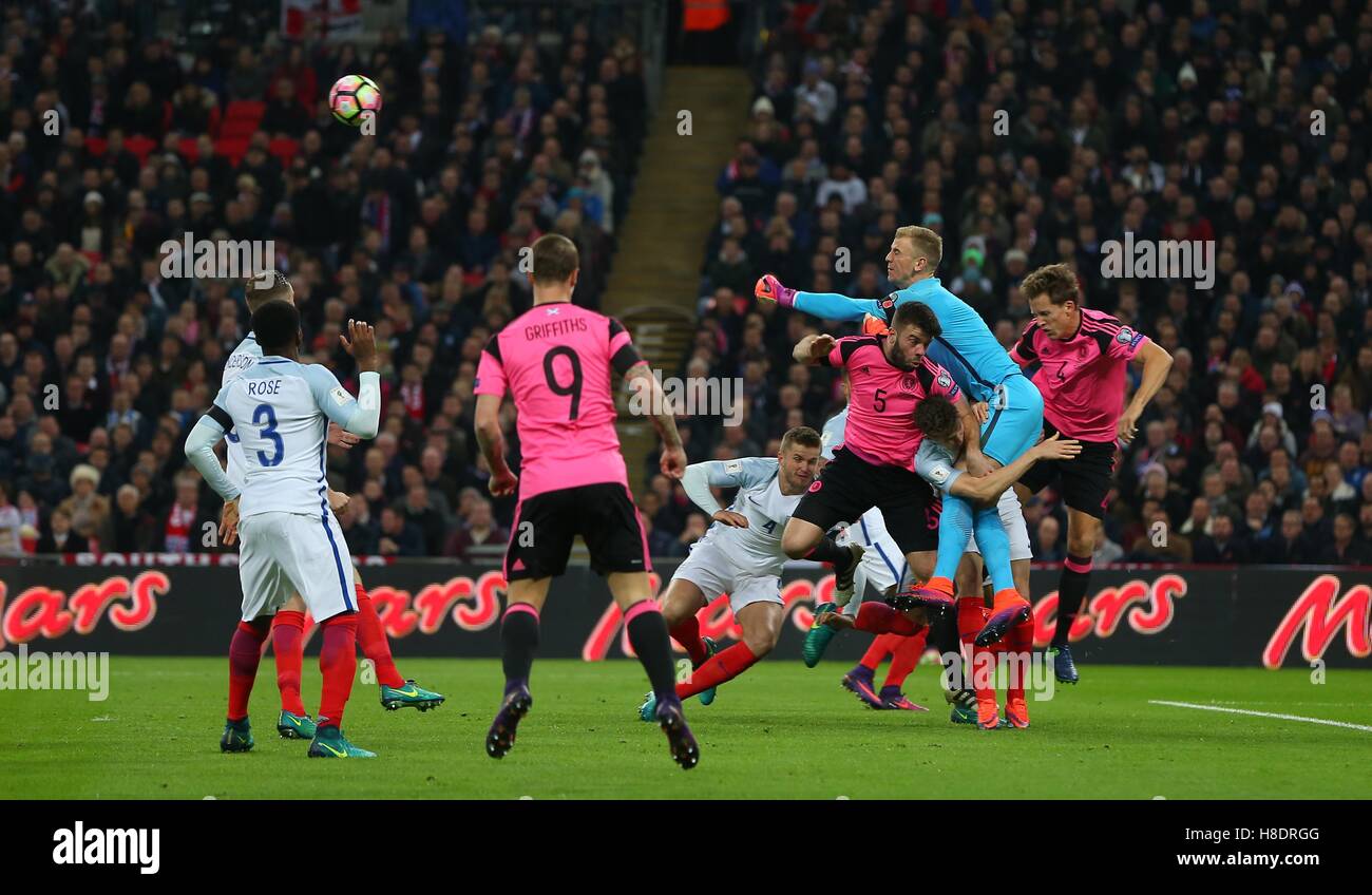 Wembley Stadium, London, UK.11th November 2016.  Joe Hart punches clear during the FIFA World Cup Qualifier match between England and Scotland at Wembley Stadium in London.  Credit: Telephoto Images / Alamy Live News Stock Photo