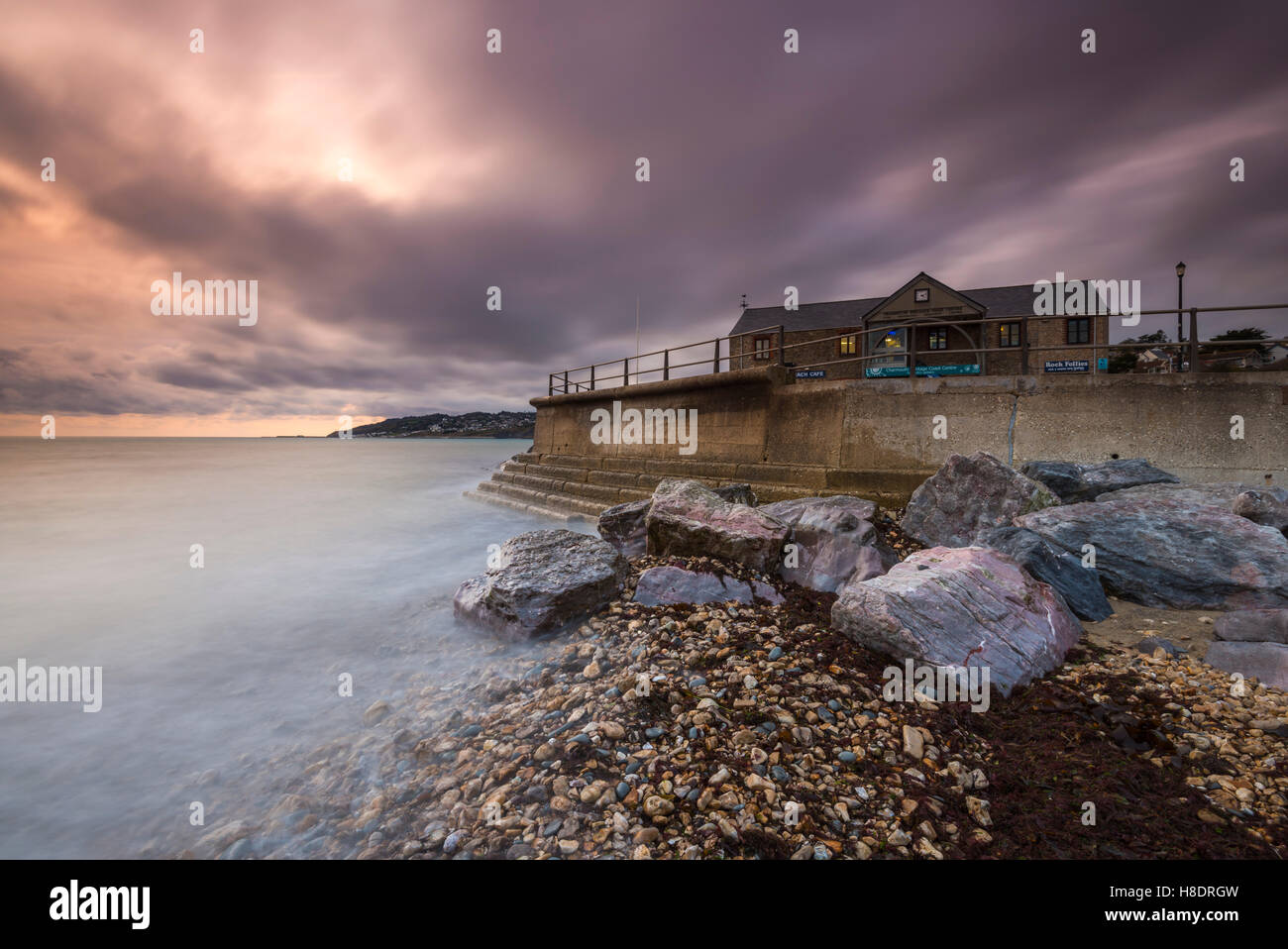 Charmouth, Dorset, UK.  11th November 2016.   UK Weather.  Thickening clouds above the Charmouth Heritage Coast Centre on the Jurassic Coast of Dorset at dusk ahead of a night of forecast rain.  Picture: Graham Hunt/Alamy Live News Stock Photo