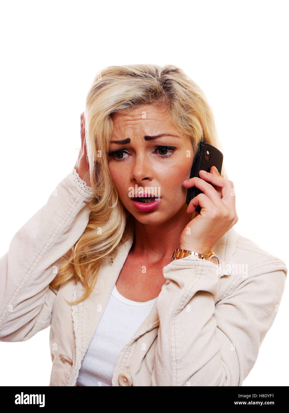 A attractive woman is talking on her cell phone. Stock Photo