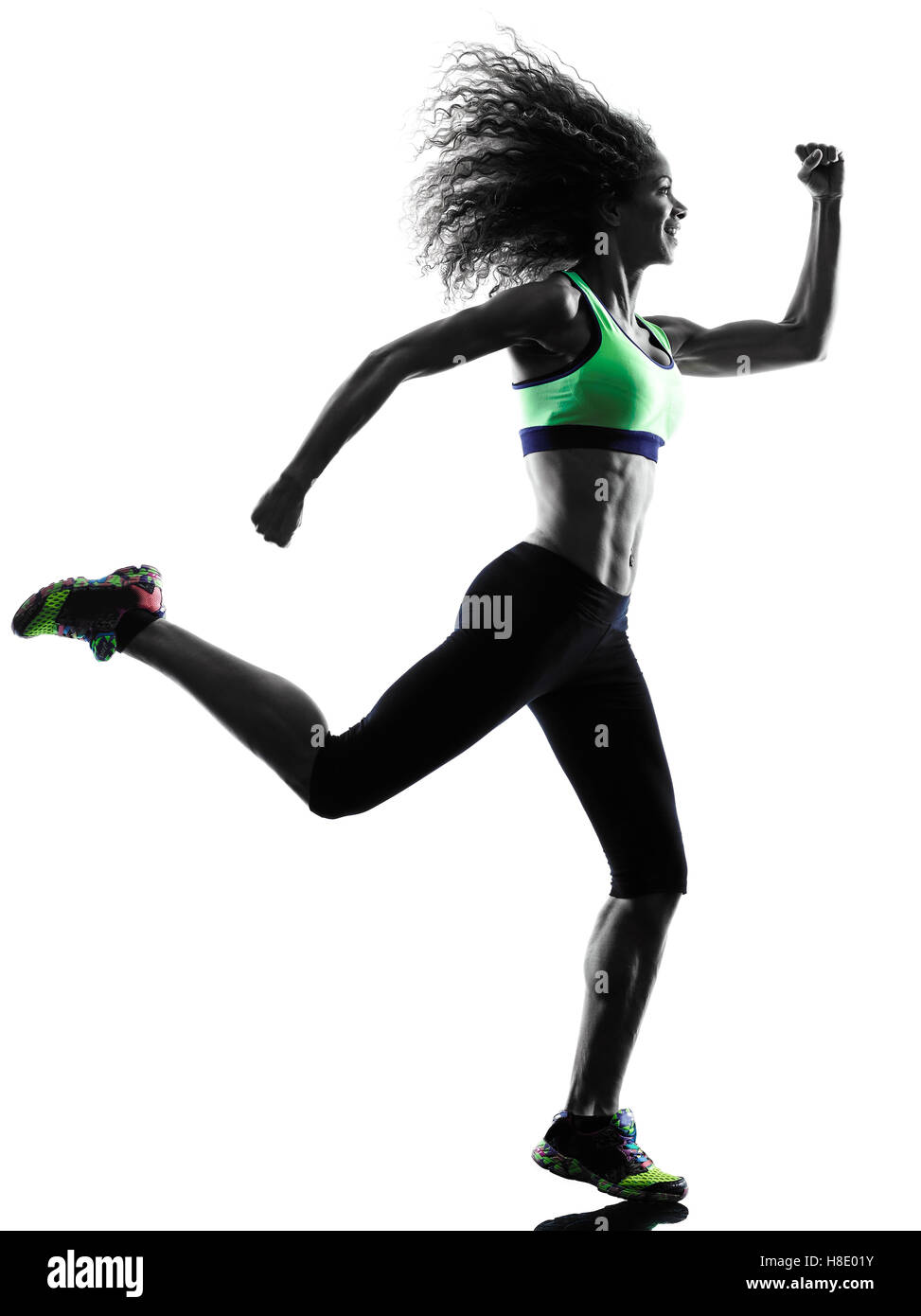 one african woman runner jogger running jogging  in studio silhouette isolated on white background Stock Photo