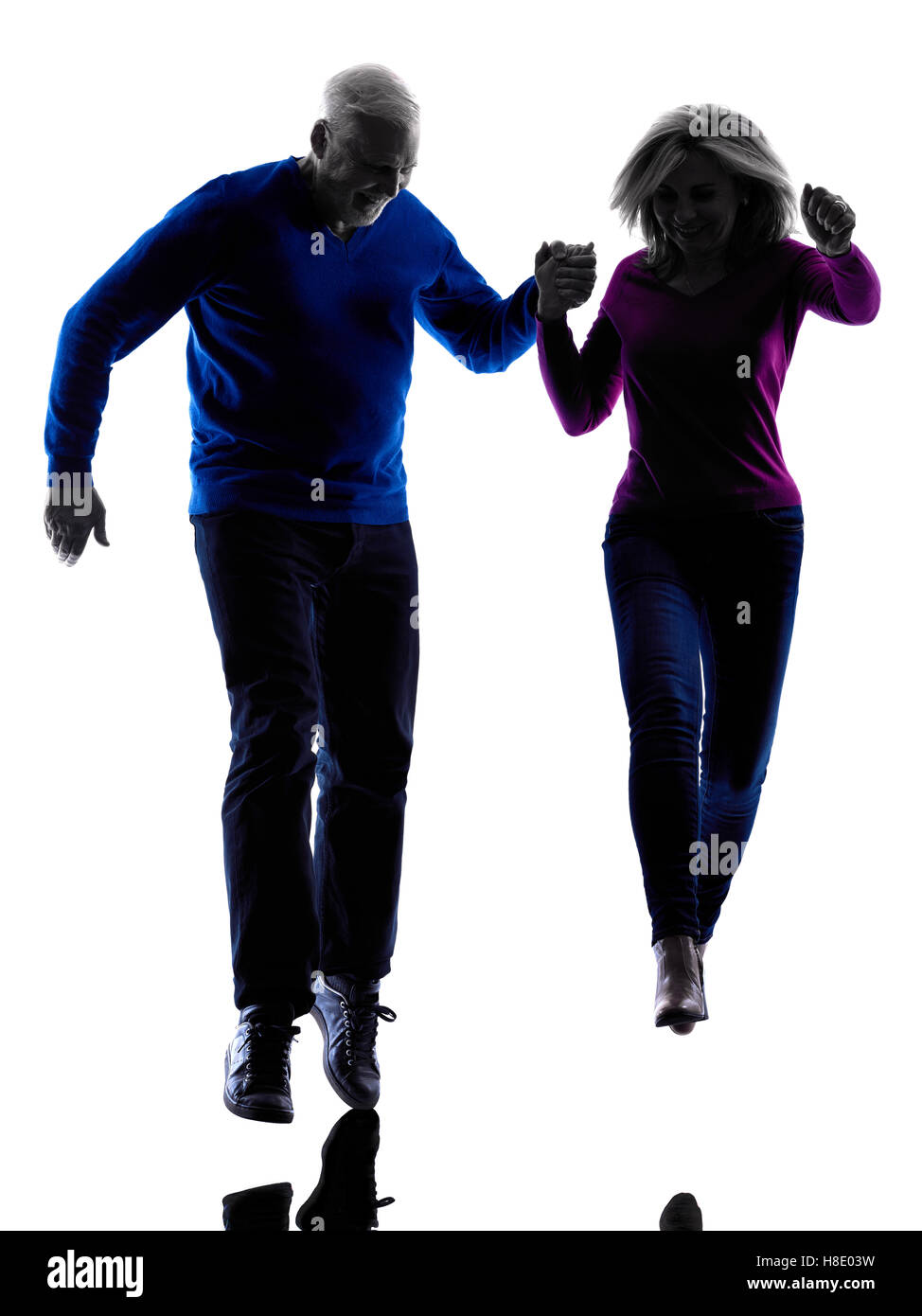 one caucasian couple senior silhouette in silhouette studio isolated on ...
