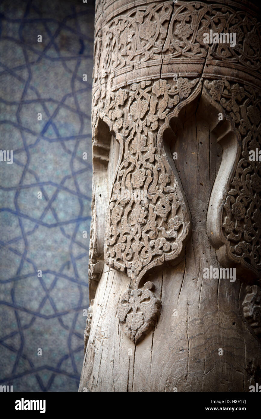Carved wood pillar inside the Kunya Ark, Khiva, Uzbekistan - architecture Stock Photo