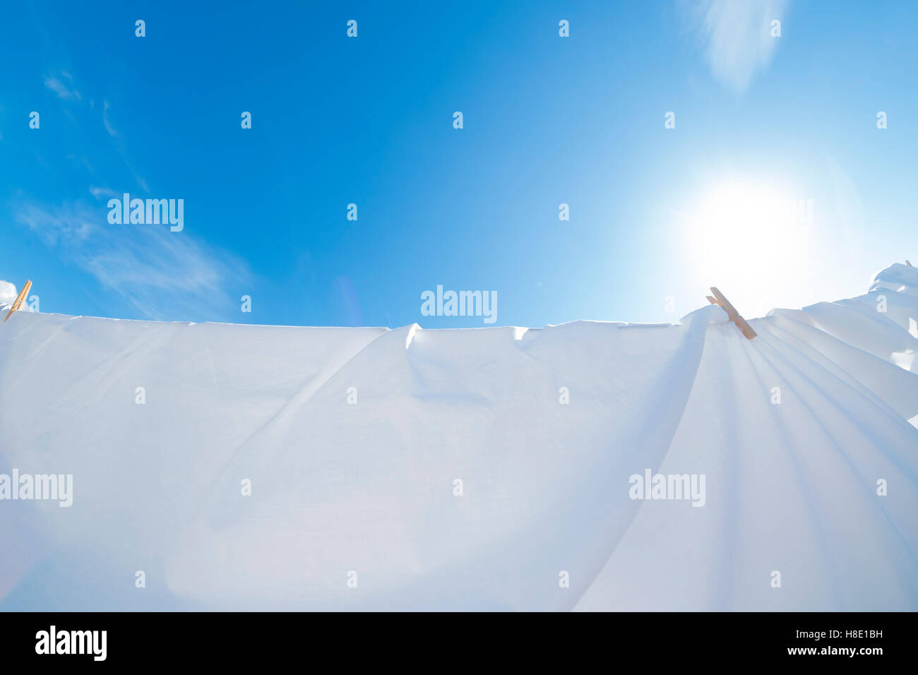 Clean white sheets drying in the sun Stock Photo Alamy