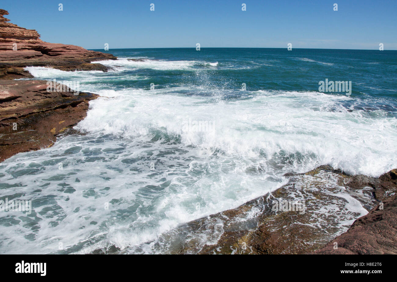 Pot Alley coastline with red sandstone rock formations, Indian Ocean ...
