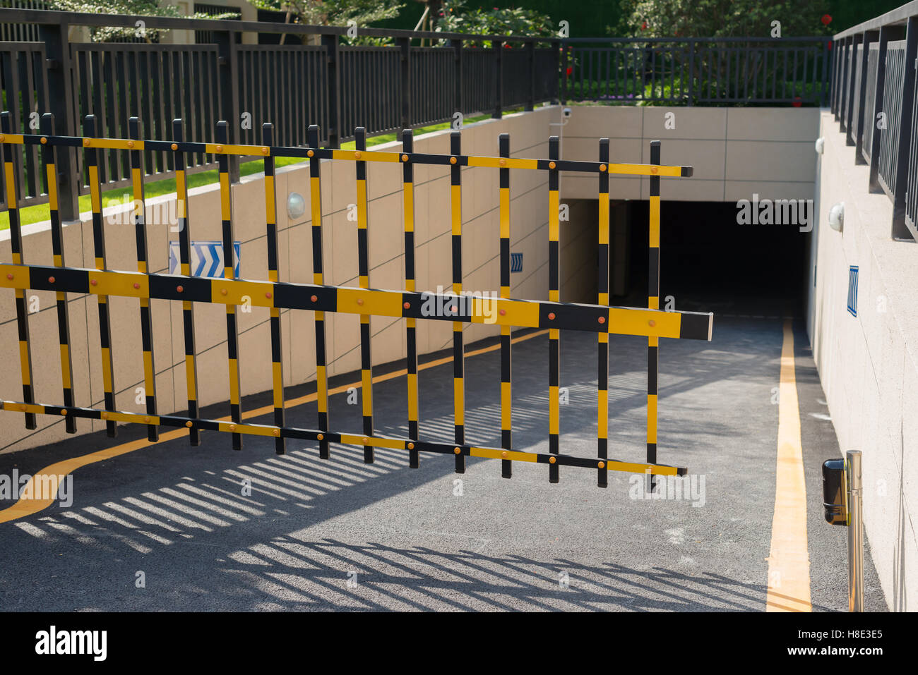 Vehicle security barrier closed - entrance to an underground car park Stock Photo